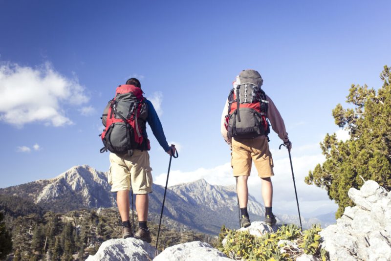 Mountain trail at sunrise representing the journey of running a business (on hiking)